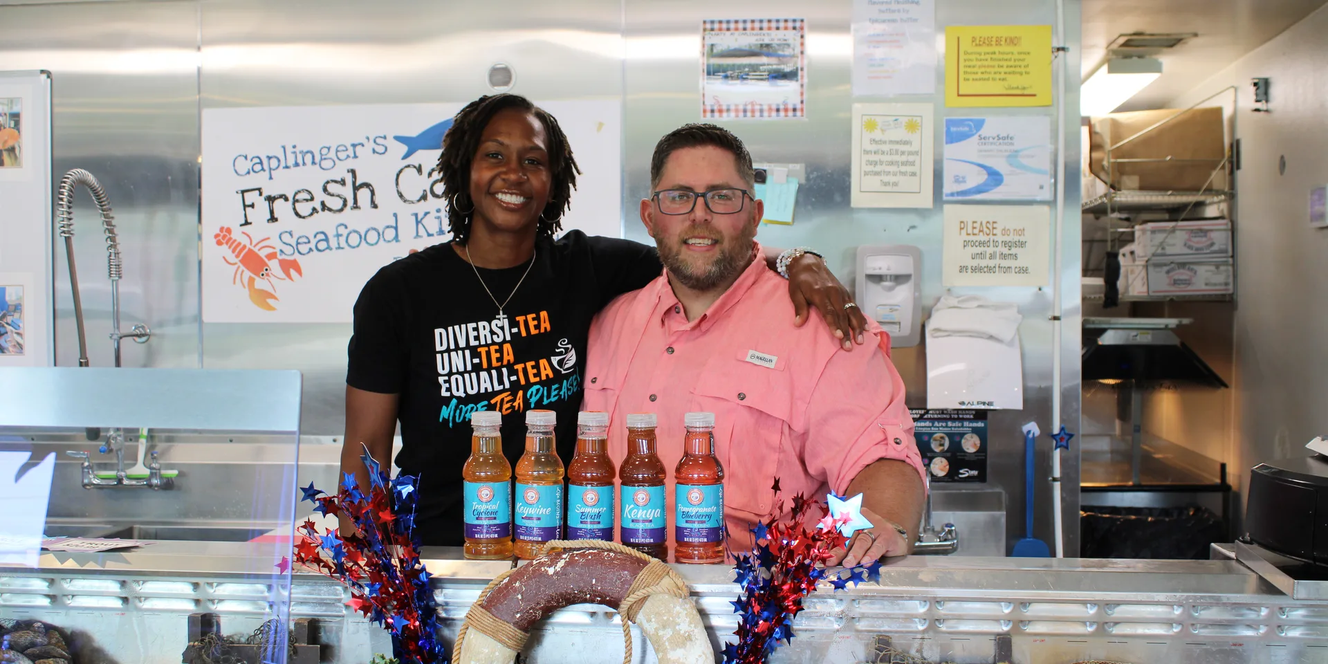 The Caplinger's crew behind the counter
