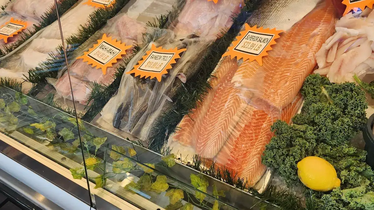 The fresh seafood case at Caplinger's Fresh Catch market in Indianapolis, stocked with salmon, crab and shellfish